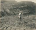 Igorot man turning sod