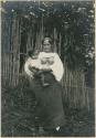 Igorot woman with her baby