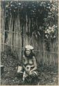 Igorot woman squatting