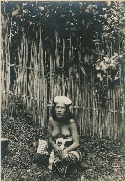 Igorot woman squatting