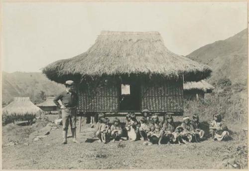 Igorot women and children in front of house at Ambuklao