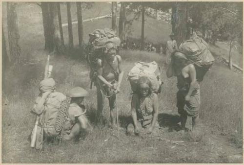 Igorot women carrying camotes