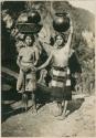 Two Igorot women with their finished pots to sell