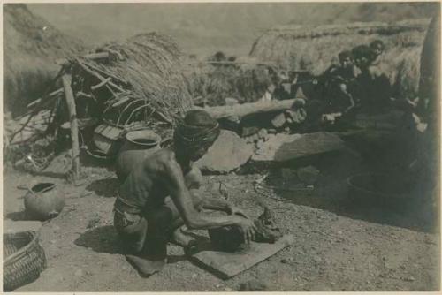 Igorot woman beginning to make pot