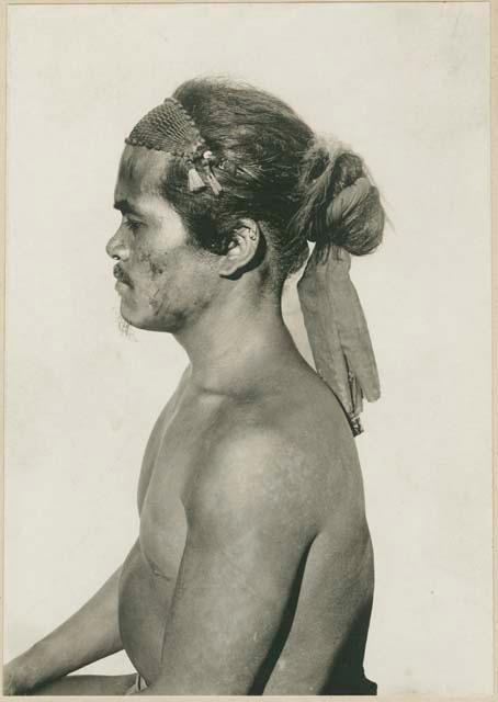 Ilongot man with hair net and shell girdle