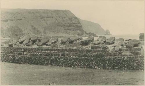 Moai face down on large platform at Tongariki