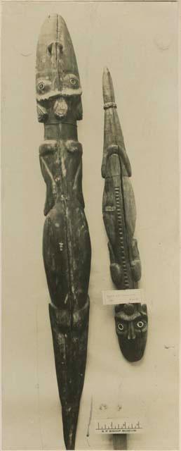 Two carved wooden zoomorphic figures