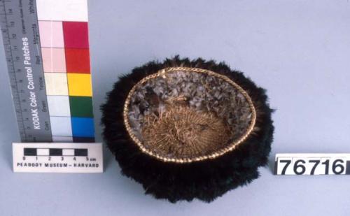 Basket with feathers