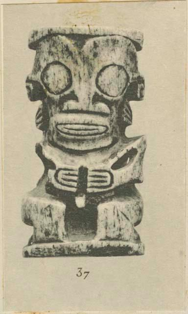 Chief's collar ornament of carved human bone