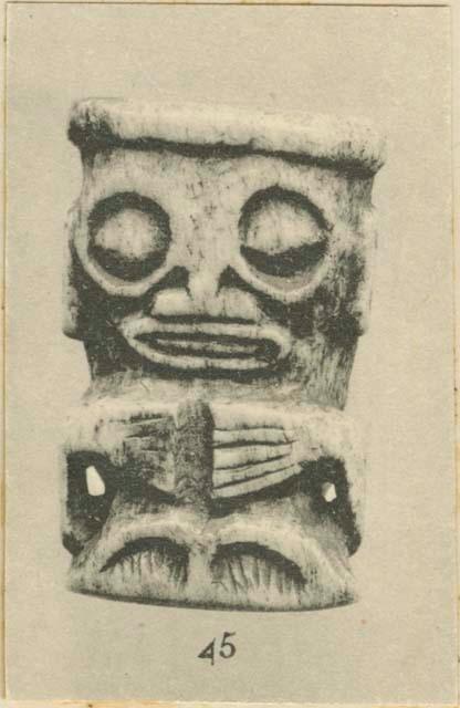 Chief's collar ornament of carved human bone