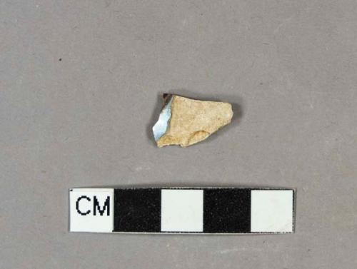 Factory decorated whiteware body sherd with blue and brown decoration