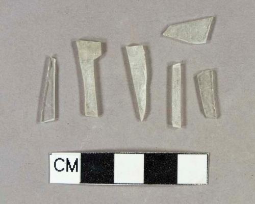 Colorless flat glass fragments, three crossmend