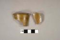 Light brown salt glazed stoneware vessel  rim and body fragments, gray paste, likely nottingham ware, undecorated