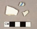 White porcelain vessel fragments, 2 body fragments, 1 with blue handpainted line, 1 undecorated rim fragment