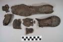 Leather shoe sole and heel fragments, some nails intact, nailed