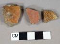 Reddish-brown salt glazed stoneware vessel body fragments, gray paste, undecorated