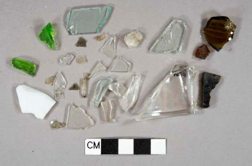 Vessel glass fragments, 21 Colorless glass fragments, 2 light aqua glass fragments, 1 white milk glass fragments, 2 bright green glass fragments, 3 amber glass fragments