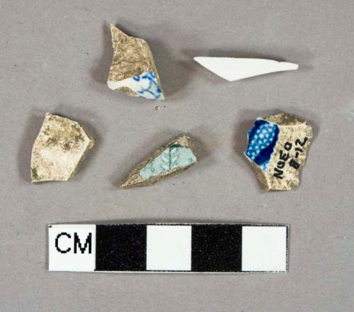 White lead glazed earthenware, likely pearlware vessel body fragments, 2 blue on white transferprinted decration, 1 green on white transferprinted decoration