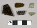 Olive glass vessel body fragments