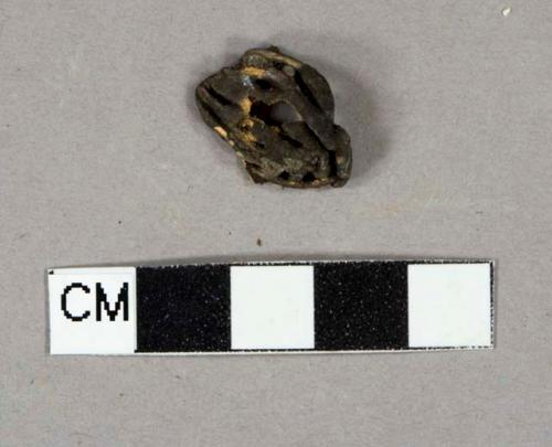 Fruit pit fragment, likely peach