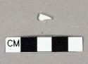 White undecorated porcelain vessel body fragment