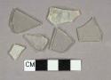 Colorless glass fragments, 9 flat glass fragments, 14 vessel fragments
