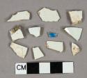 White undecorated pearlware vessel body fragments, 1 fragment with blue transfer print decoration