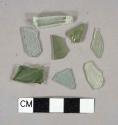 Aqua glass fragments, 11 vessel fragments, 9 flat glass fragments