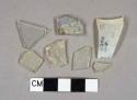 Colorless glass fragments, 11 flat glass fragments, 21 vessel fragments