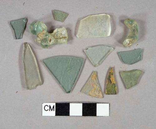 Aqua glass fragments, 8 flat glass fragments, 2 melted