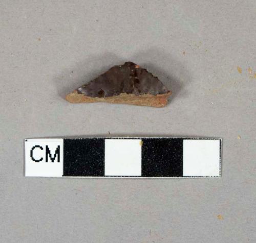 dark brown salt glaze stoneware vessel body fragment, reddish paste, likely Nottingham type