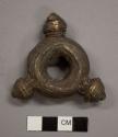 Small metal ring, cast brass; three pointed knobs
