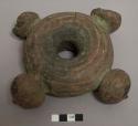 Metal ring, nitien, cast brass with clay core; parts of two knobs missing, crack, casting flaw
