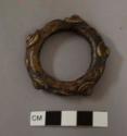 Small metal ring, cast brass; resembles nitien
