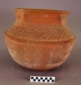 Ceramic jar, large, incised at shoulder, scalloped at shoulder and rim, abraded