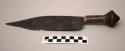 Knife used for skinning and scraping - large flat iron blade, wooden handle with