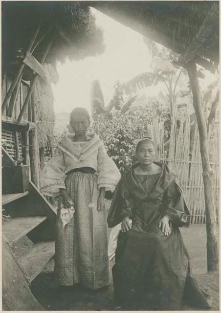 Octaviano's wife with a young Ilocano girl