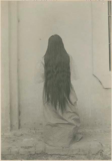 Ilocano woman showing length of hair