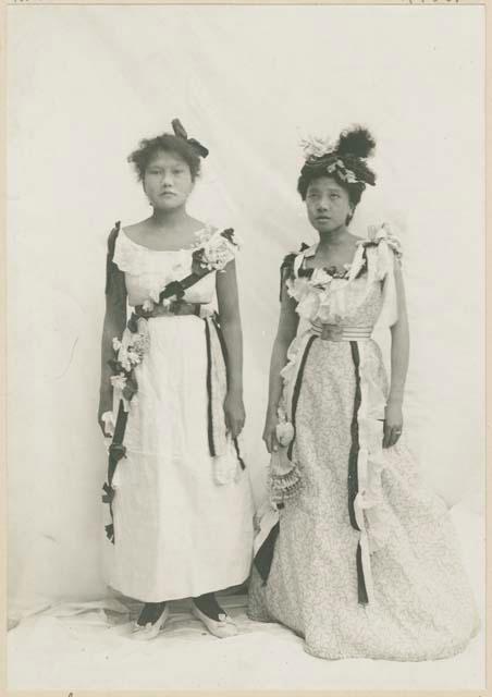 Two Ilocano women dressed for theatrical performance