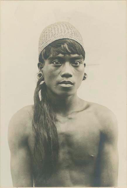 Young Kalinga Warrior wearing basket hat