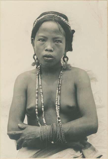 Young Kalinga girl wearing traditional Kalinga earrings
