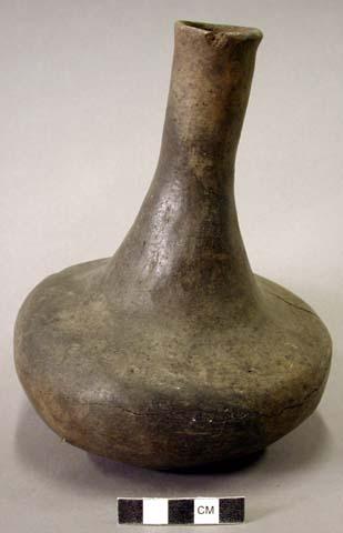 Ceramic jar, long neck, plain, mended, missing one body sherd