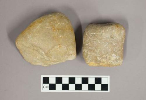 2 Limestone pebble tools flaked along one edge on one face