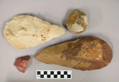 Chipped stone tools, including handaxes, bifaces, and cores