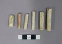 Pieces of ceramic pipe stems; Largest: 4.7 cm x 0.9 cm, smallest: 2.6 cm x 0.9 c
