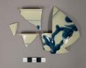 Pieces of ceramic; Scratch blue, salt glaze chamberpot; 2.5 cm - smallest piece,