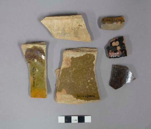 Pieces of pottery; Brown, green and black glazed; Largest piece: 7.8 cm x 8.5 cm