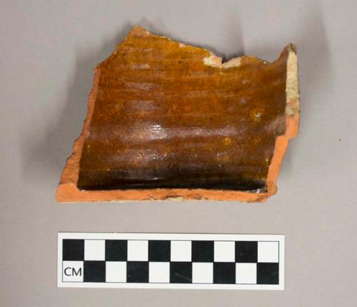 Basal and body sherd from straight sided jug or large cup; Coarse red ware with