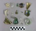 Pieces of bottle glass: 3 basal sherds and one complete neck sherd; Most with pa