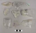 Pieces of glass bottle sherds; 2 small intact medicinal bottles; Screw-top bottl